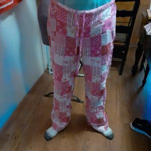 Pink pajama bottoms patched pink/white patterns